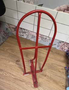 Red Saddle Rack for dressage saddle blanket storage